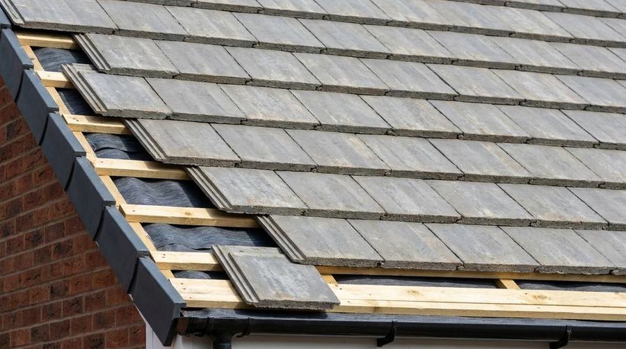 New concrete tile roof being laid on battens